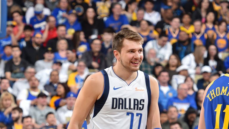 Luka Doncic #77 of the Dallas Mavericks smiles during a game against the Golden State Warriors on March 22, 2019 at ORACLE Arena in Oakland, California.
