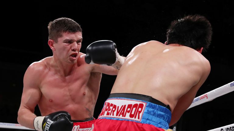 Luke Campbell lands a shot on Adrian Yung during their bout at the Liacouras Center in Philadelphia (Credit:Ed Mulholland/Matchroom Boxing USA)