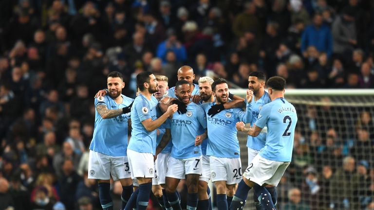 Manchester City celebrate after scoring against Watford