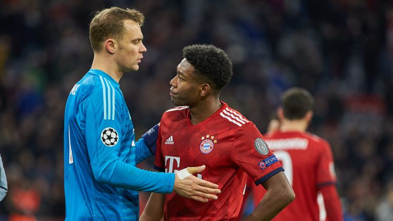 Bayern Munich's Manuel Neuer and David Alaba react to their European exit