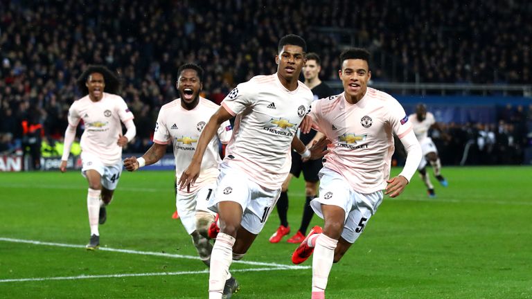 Marcus Rashford celebrates scoring against Paris Saint-Germain