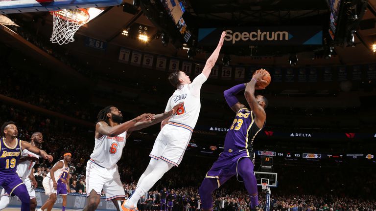 Mario Hezonja #8 of the New York Knicks blocks the shot against LeBron James #23 of the Los Angeles Lakers during the game on March 17, 2019 at Madison Square Garden in New York City, New York.