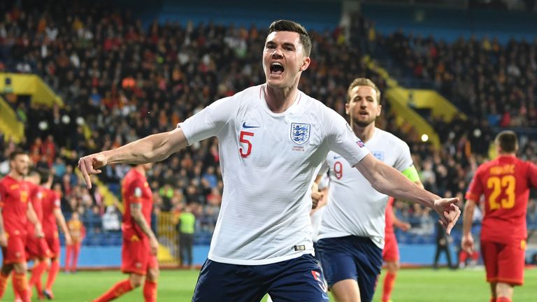 Michael Keane celebrates scoring in England's European Qualifier against Montenegro