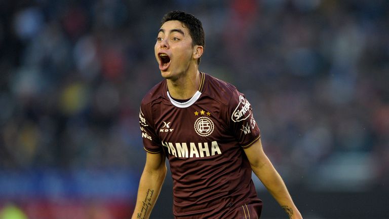 Miguel Almiron celebrates scoring the second goal for Lanus in their 4-0 win over San Lorenzo in the final of the Argentine league in May 2016