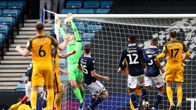 Millwall's David Martin spills the ball into his net