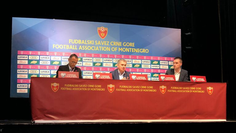 Montenegro head coach Ljubisa Tumbakovic answers media questions after their 5-1 defeat to England in a European Qualifier was marred by claims of racist chanting