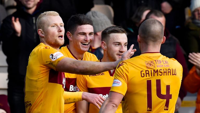 Curtis Main, Jake Hastie, Allan Campbell and Liam Grimshaw celebrate Motherwell's third goal
