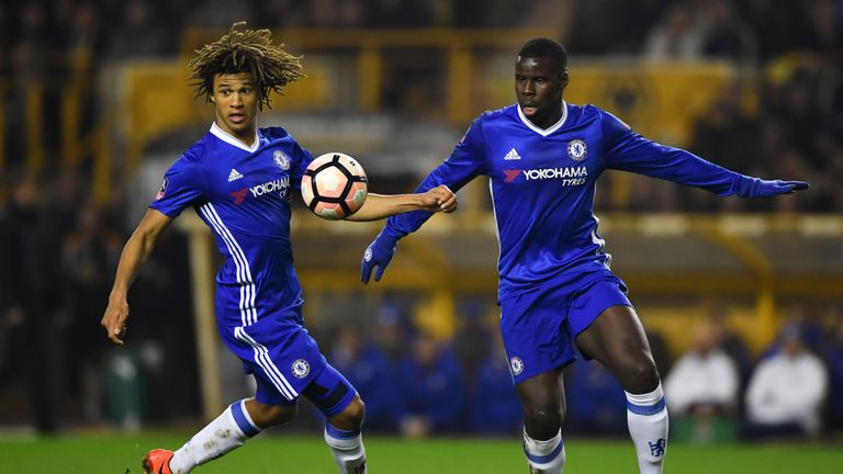 Nathan Ake of Chelsea (L) and Kurt Zouma of Chelsea (R) look at the ball during The Emirates FA Cup Fifth Round match between Wolverhampton Wanderers and Chelsea at Molineux on February 18, 2017 in Wolverhampton, England.