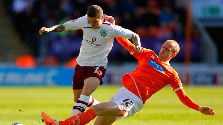 Neal Bishop of Blackpool and Kieran Trippier of Burnley during the Sky Bet Championship match between Blackpool and Burnley at Bloomfield Road on April 18, 2014 in Blackpool, England. (Photo by Paul Thomas/Getty Images)