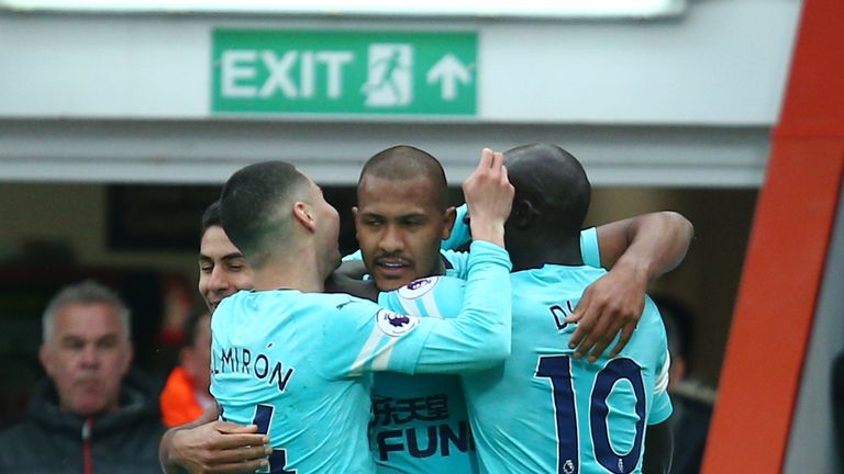 Salomon Rondon celebrates after scoring Newcastle's first goal with Miguel Almiron and Mohamed Diame