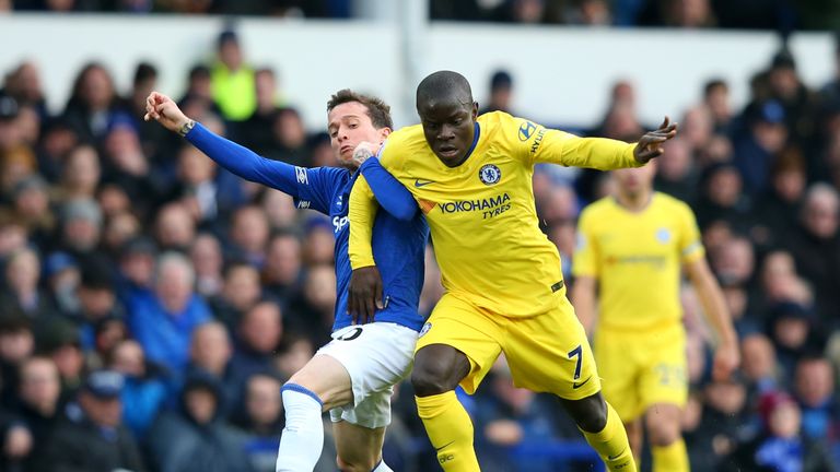 Chelsea midfielder N'Golo Kante is challenged by Everton's Bernard