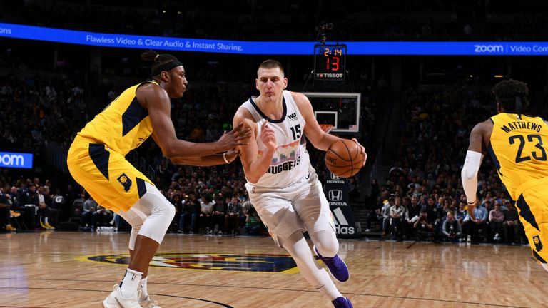 Nikola Jokic #15 of the Denver Nuggets handles the ball against the Indiana Pacers on March 16, 2019 at the Pepsi Center in Denver, Colorado.