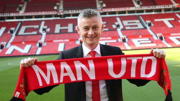 Ole Gunnar Solskjaer is seen during a photo call at Old Trafford after it was announced that he was appointed as the clubs full-time manager on a three-year contract