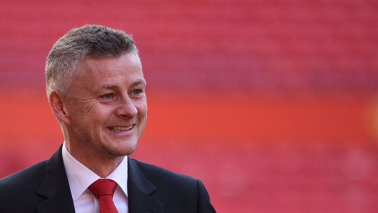 Ole Gunnar Solskjaer is seen during a photo call at Old Trafford after it was announced that he was appointed as the clubs full-time manager on a three-year contract