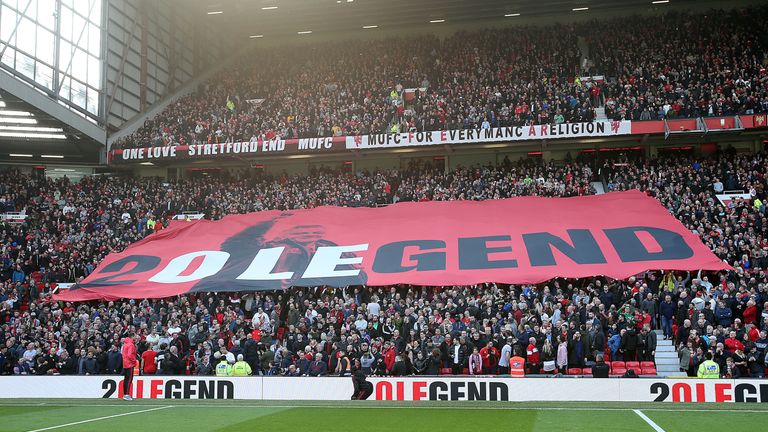 A banner celebrating Ole Gunnar Solskjaer is displayed ahead of Manchester United's match against Watford