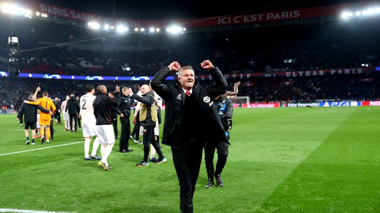 Ole Gunnar Solskjaer celebrates following Manchester United&#39;s win at Paris St. Germain in the Champions League.
