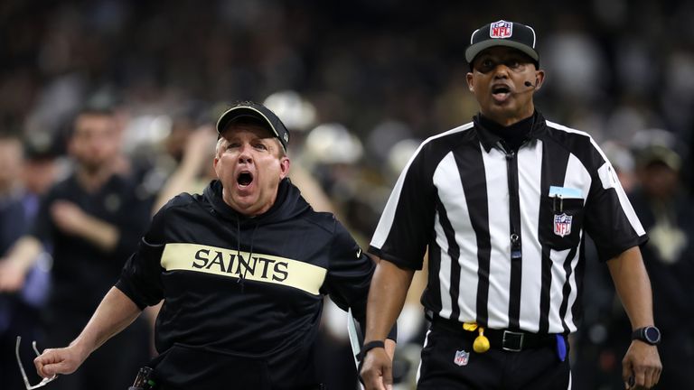 Saints head coach Sean Payton, left, reacts to a controversial non-call  during the NFC Championship game