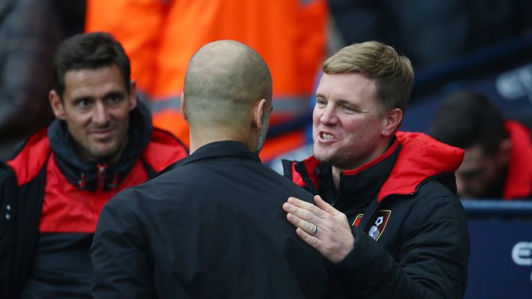  Eddie Howe, Manager of AFC Bournemouth greets Josep Guardiola, Manager of Manchester City prior to the Premier League match between Manchester City and AFC Bournemouth at Etihad Stadium on December 23, 2017 in Manchester, England
