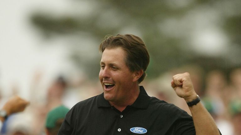 Phil Mickelson celebrates after birdieing the 18th to win the 2004 Masters