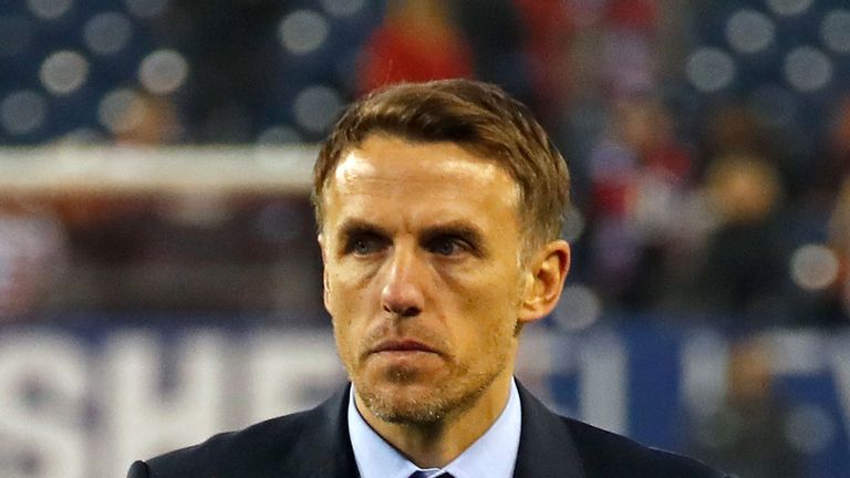 Head coach Phil Neville of England watches from the sideline during the 2019 SheBelieves Cup match between USA and England at Nissan Stadium on March 2, 2019 in Nashville, Tennessee