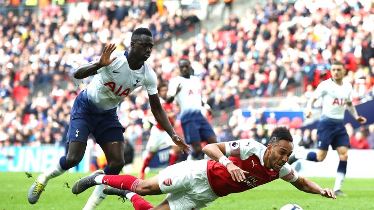 Pierre-Emerick Aubameyang is fouled by Davinson Sanchez in the last minute of normal time