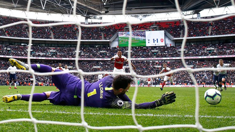 Tottenham's Hugo Lloris saves a penalty from Arsenal's Pierre-Emerick Aubameyang
