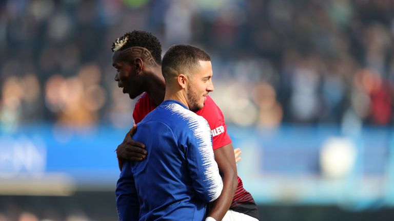 Paul Pogba and Eden Hazard during the Premier League match between Chelsea FC and Manchester United at Stamford Bridge on October 20, 2018 in London, United Kingdom.