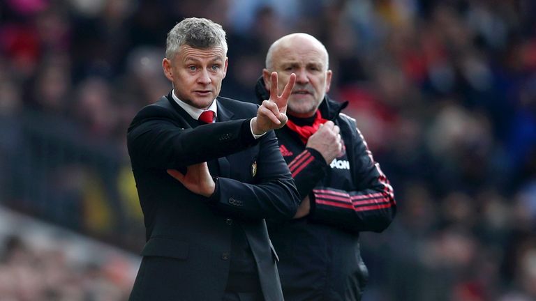 Mike Phelan joins Ole Gunnar Solskjaer on the sideline during Manchester United's win over Watford in the Premier League.