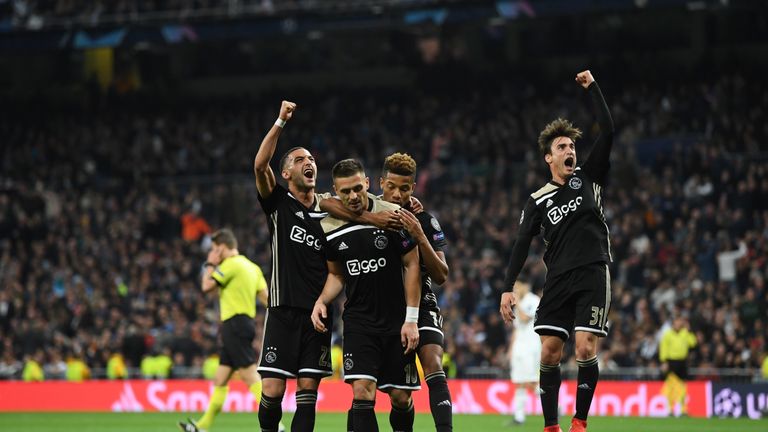 Dusan Tadic celebrates his goal for Ajax away to Real Madrid