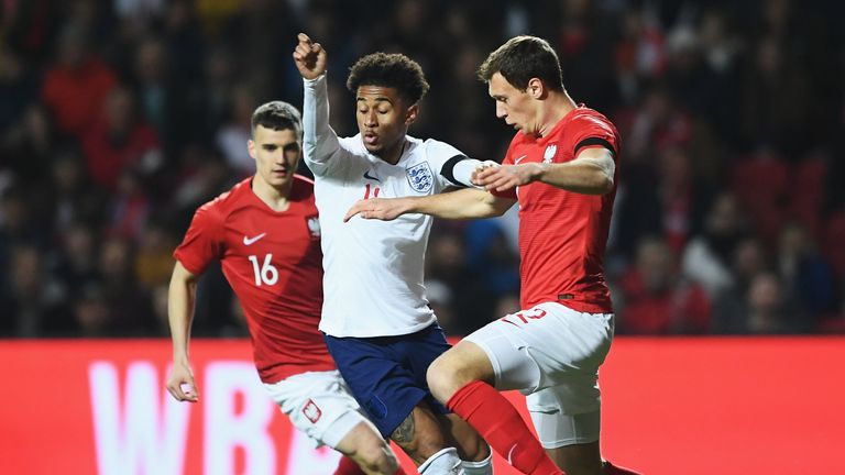 Reiss Nelson tries to break through the Poland U21s' defence