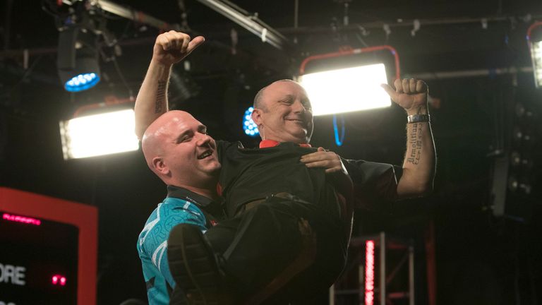 Rob Cross knocked out Darren Webster to reach the last 32
