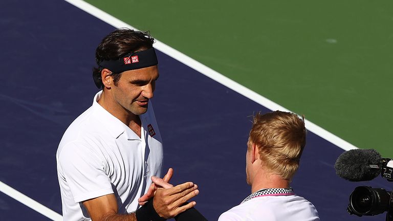 Roger Federer of Switzerland shakes hands at the net after his straight sets victory against Kyle Edmund of Great Britain during their men&#39;s singles fourth round match on day ten of the BNP Paribas Open at the Indian Wells Tennis Garden on March 13, 2019 in Indian Wells, California.