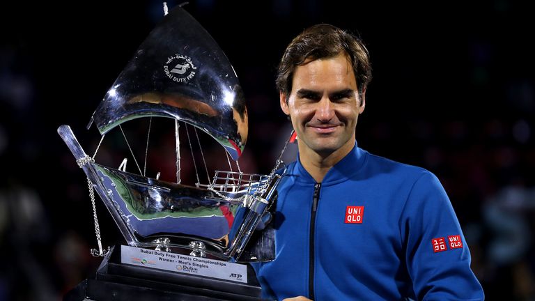 Roger Federer of Switzerland poses with the winners trophy after victory during day fourteen of the Dubai Duty Free Championships at Dubai Tennis Stadium on March 02, 2019 in Dubai, United Arab Emirates.