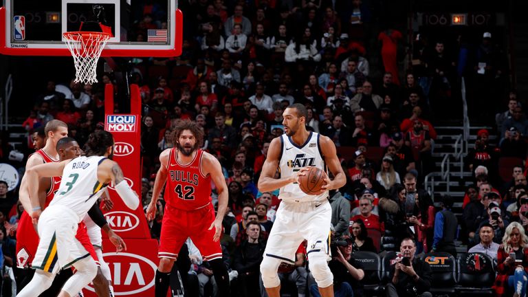 Rudy Gobert #27 of the Utah Jazz handles the ball against the Chicago Bulls on March 23, 2019 at United Center in Chicago, Illinois.