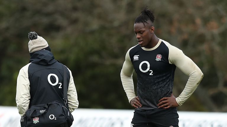 Maro Itoje consults with England physio Bob Stewart after pulling up in pain during training