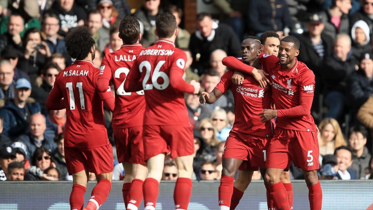 Sadio Mane celebrates with Liverpool team-mates after scoring against Fulham