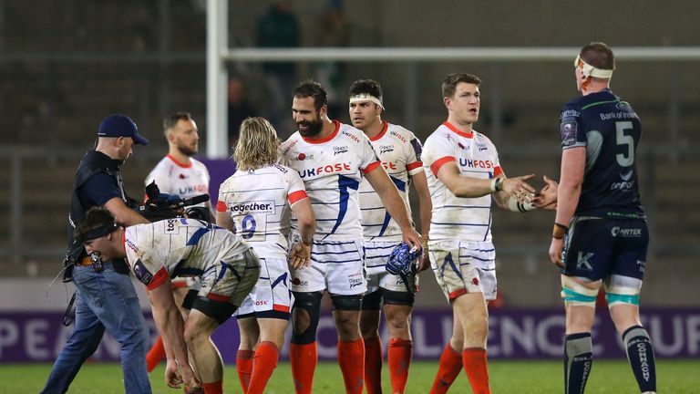 The Sale players celebrate at the final whistle after reaching the last four