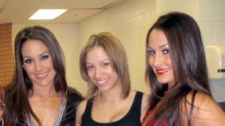 Long before she was The Boss, Sasha Banks was having her picture taken with the Bella Twins
