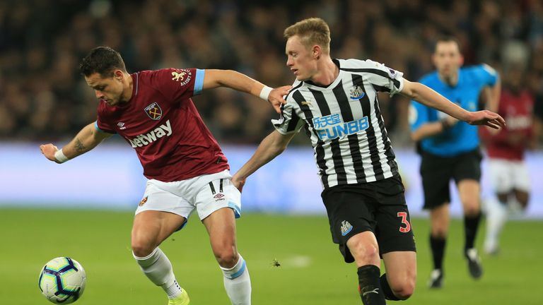 Javier Hernandez of West Ham United battles for possession with Sean Longstaff of Newcastle United during the Premier League match between West Ham United and Newcastle United at London Stadium on March 02, 2019 in London, United Kingdom.