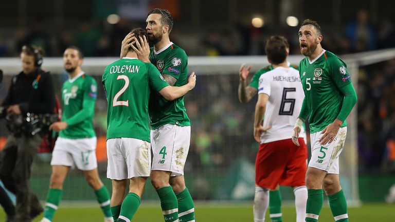 Shane Duffy hugs Seamus Coleman following Ireland's 1-0 victory over Georgia