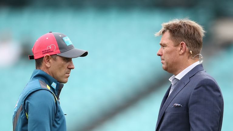 Justin Langer, coach of Australia, speaks with former Australian Cricketer Shane Warne during day four of the Fourth Test match in the series between Australia and India at Sydney Cricket Ground on January 06, 2019 in Sydney, Australia. 