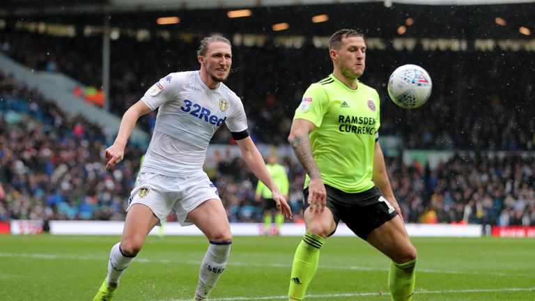Sheffield United's Billy Sharp and Leeds' Luke Ayling battle for the ball