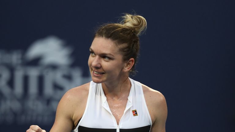 Simona Halep of Romania celebrates after defeating Venus Williams during day 8 of the Miami Open presented by Itau at Hard Rock Stadium on March 25, 2019 in Miami Gardens, Florida