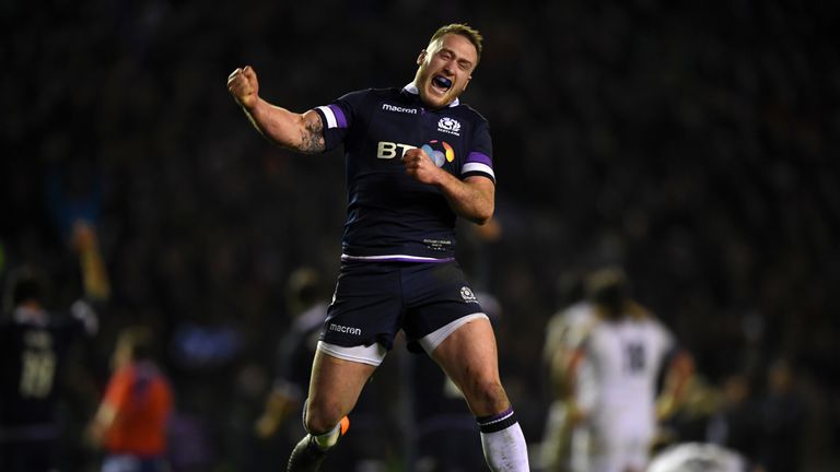 Stuart Hogg celebrates beating England in the 2018 Six Nations