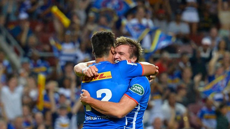 Dan du Plessis celebrating mid-match after scoring a try