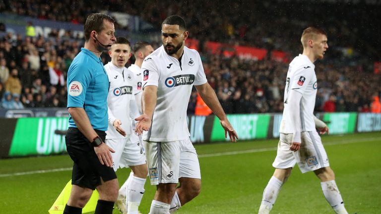 Swansea City's Cameron Carter-Vickers appeals to match referee Andre Marriner during the FA Cup quarter final match at the Liberty Stadium, Swansea. PRESS ASSOCIATION Photo. Picture date: Saturday March 16, 2019. See PA story SOCCER Swansea. Photo credit should read: Nick Potts/PA Wire. RESTRICTIONS: EDITORIAL USE ONLY No use with unauthorised audio, video, data, fixture lists, club/league logos or "live" services.