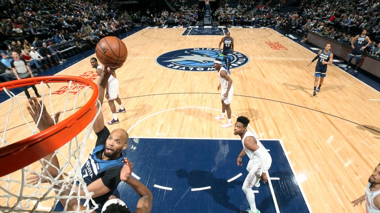 Taj Gibson #67 of the Minnesota Timberwolves goes to the basket against the New York Knicks on March 10, 2019 at Target Center in Minneapolis, Minnesota.