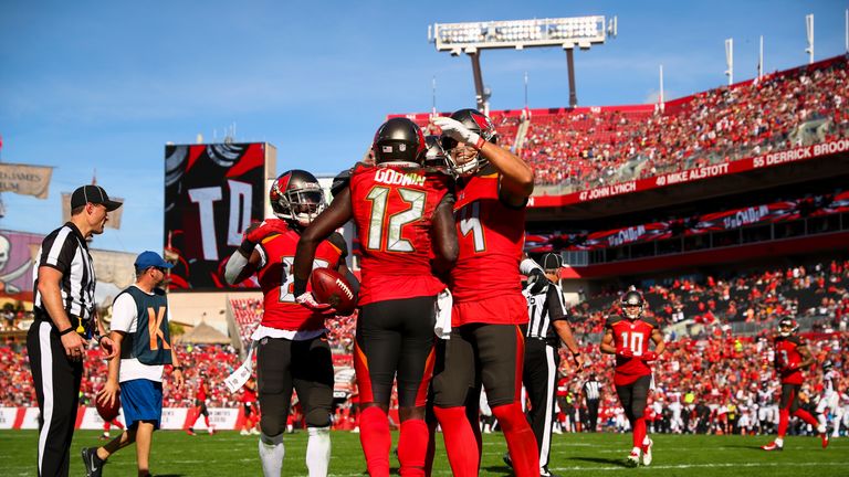 TAMPA, FL - DECEMBER 30: Wide receiver Chris Godwin #12 of the Tampa Bay Buccaneers congratulated by tight end Cameron Brate #84 his touchdown in the second quarter of the game against the Atlanta Falcons at Raymond James Stadium on December 30, 2018 in Tampa, Florida. (Photo by Will Vragovic/Getty Images)  *** Local Caption *** Chris Godwin; Cameron Brate