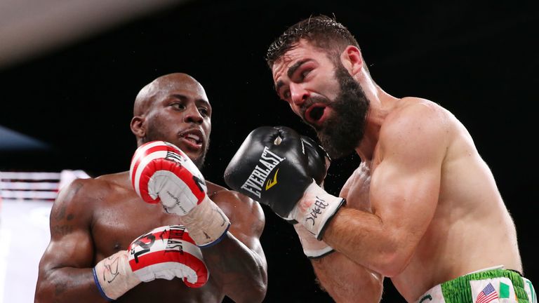 March 15, 2019; Philadelphia, PA, USA; IBF super featherweight champion Tevin Farmer  and Jono Carroll during their bout at the Liacouras Center in Philadelphia, PA.  Mandatory Credit: Ed Mulholland/Matchroom Boxing USA