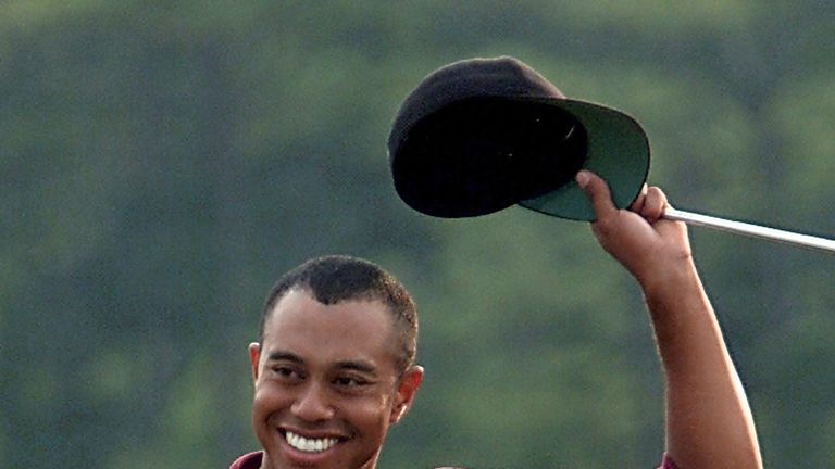 Tiger Woods salutes the crowd after winning his second Masters title in 2001